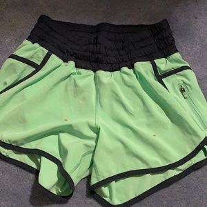 Lululemon Tracker shorts, lightly worn, small paint drops on front